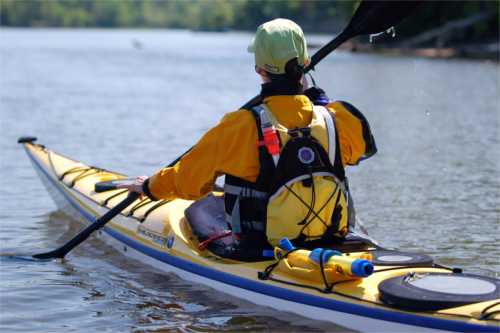 Sea kayaker from behind