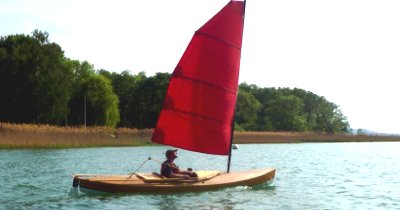 A Bufflehead sailing canoe