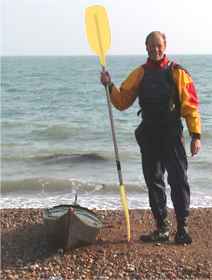 Sea kayaker in winter clothing