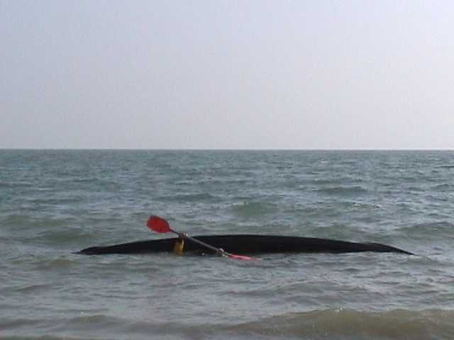 One of sequence of kayak rolling photos