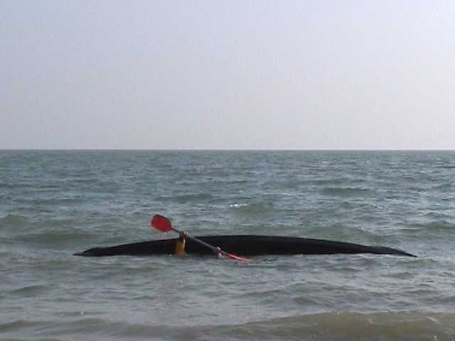 One of sequence of kayak rolling photos