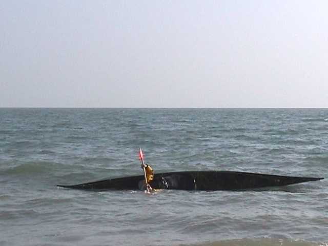One of sequence of kayak rolling photos