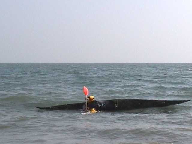 One of sequence of kayak rolling photos