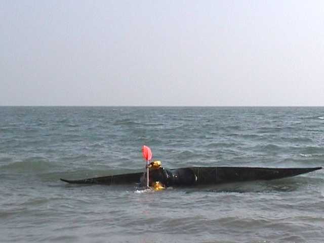 One of sequence of kayak rolling photos