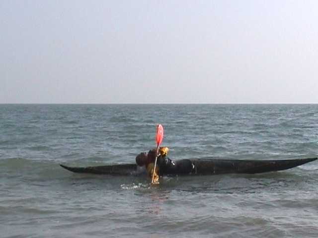 One of sequence of kayak rolling photos