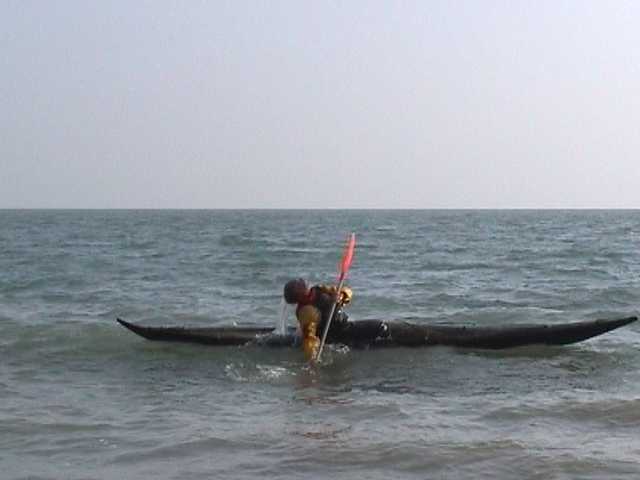 One of sequence of kayak rolling photos