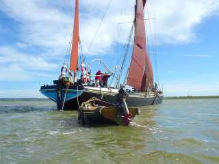 Thames sailing barge and tender