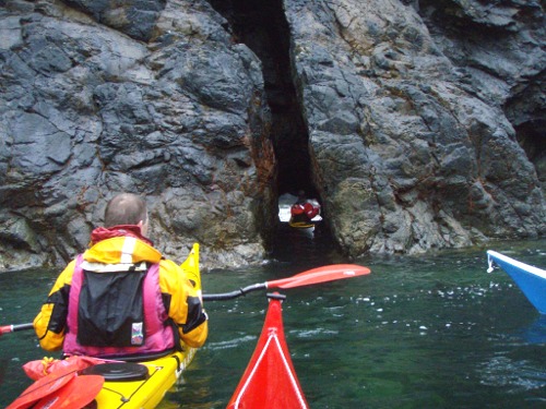 Sea kayakers entering rift