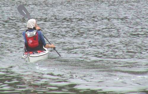 Kayaker heading away